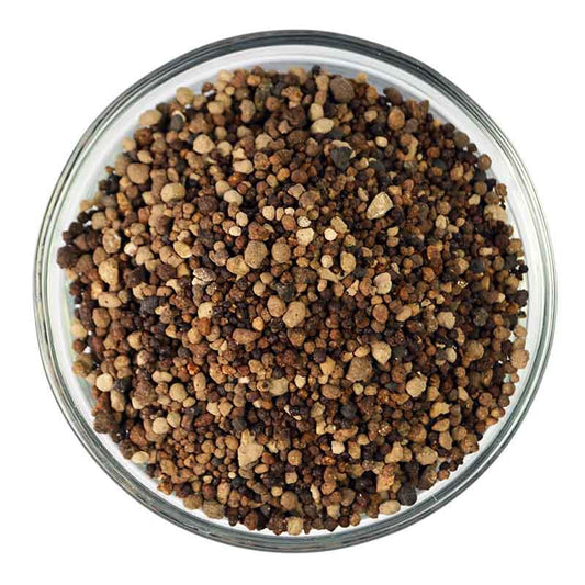 Natural mineral blend of Granular Azomite for improving soil health and crop productivity.