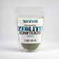 Granular clinoptilolite zeolite in a resealable bag, ideal for soil aeration and water retention.